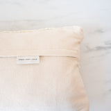 Neutral pillow with creamy cotton backing with concealed zipper